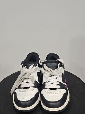 Black and White Low-Top Sneakers with Pink Accent